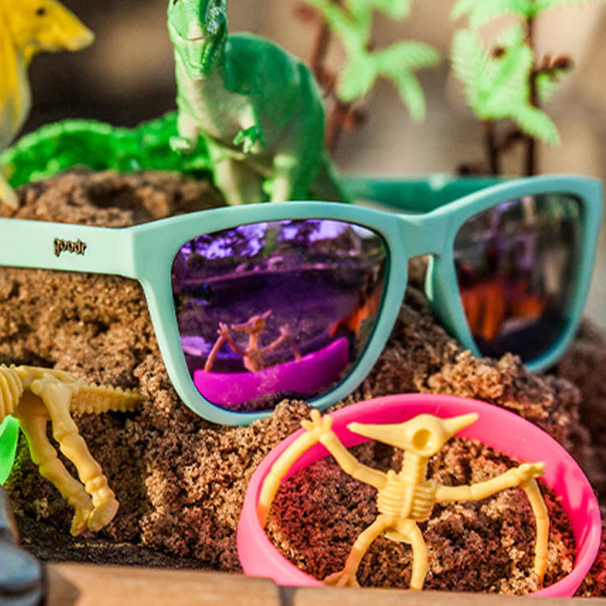 Goodr Electric Dinotopia Carnival Sunglasses - Teal/Purple