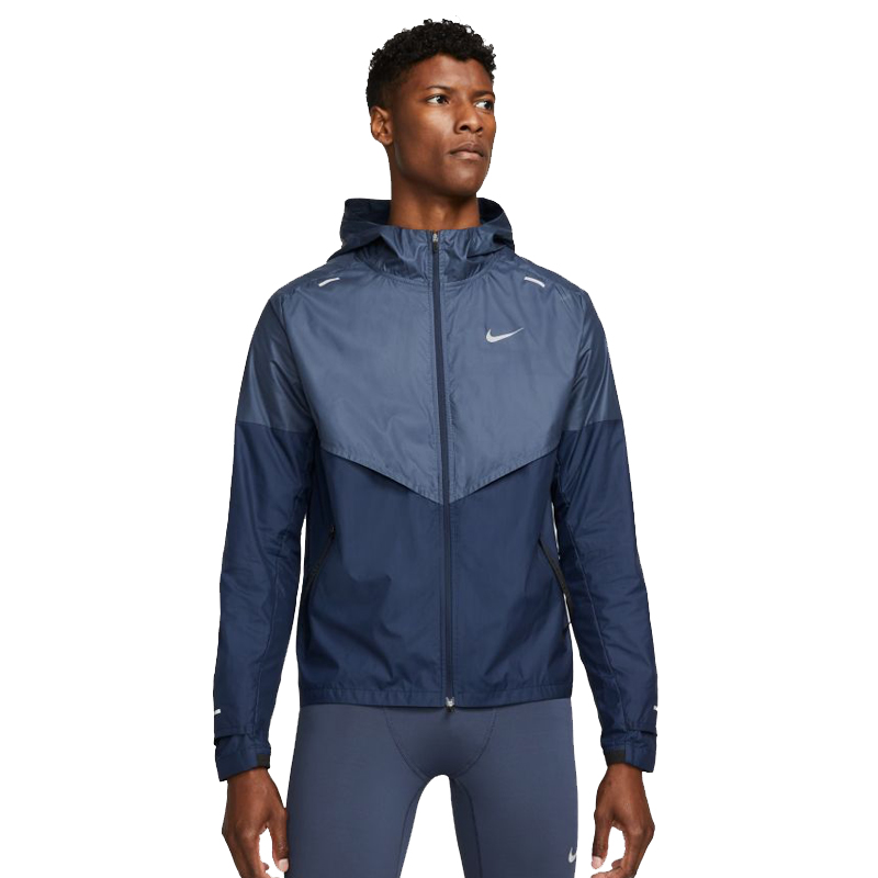 https://therunningoutlet.co.uk/wp-content/uploads/2021/10/Nike-Mens-Shieldrunner-running-jacket-CU5349-437-model-front.jpeg